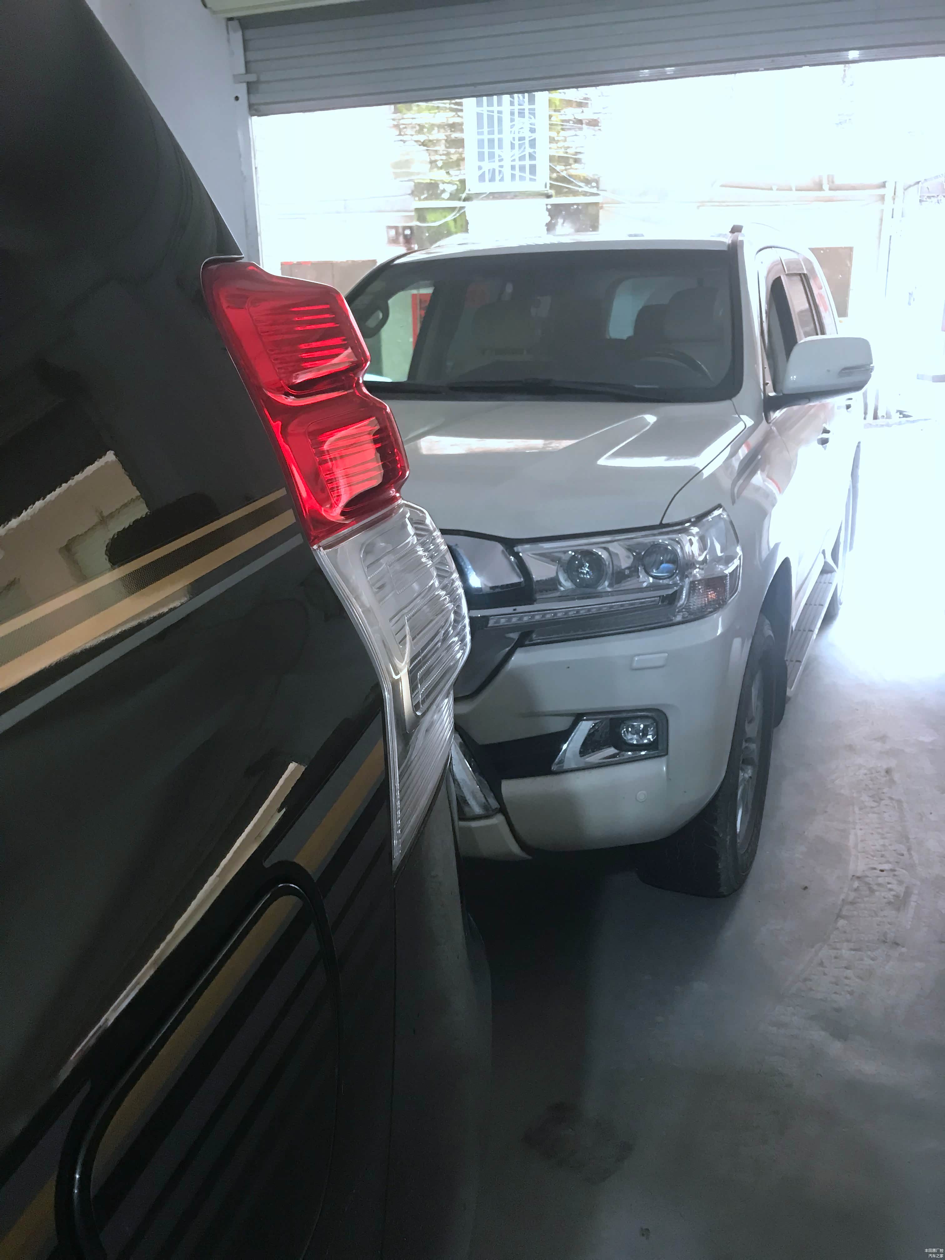 来了一辆兰德酷路泽